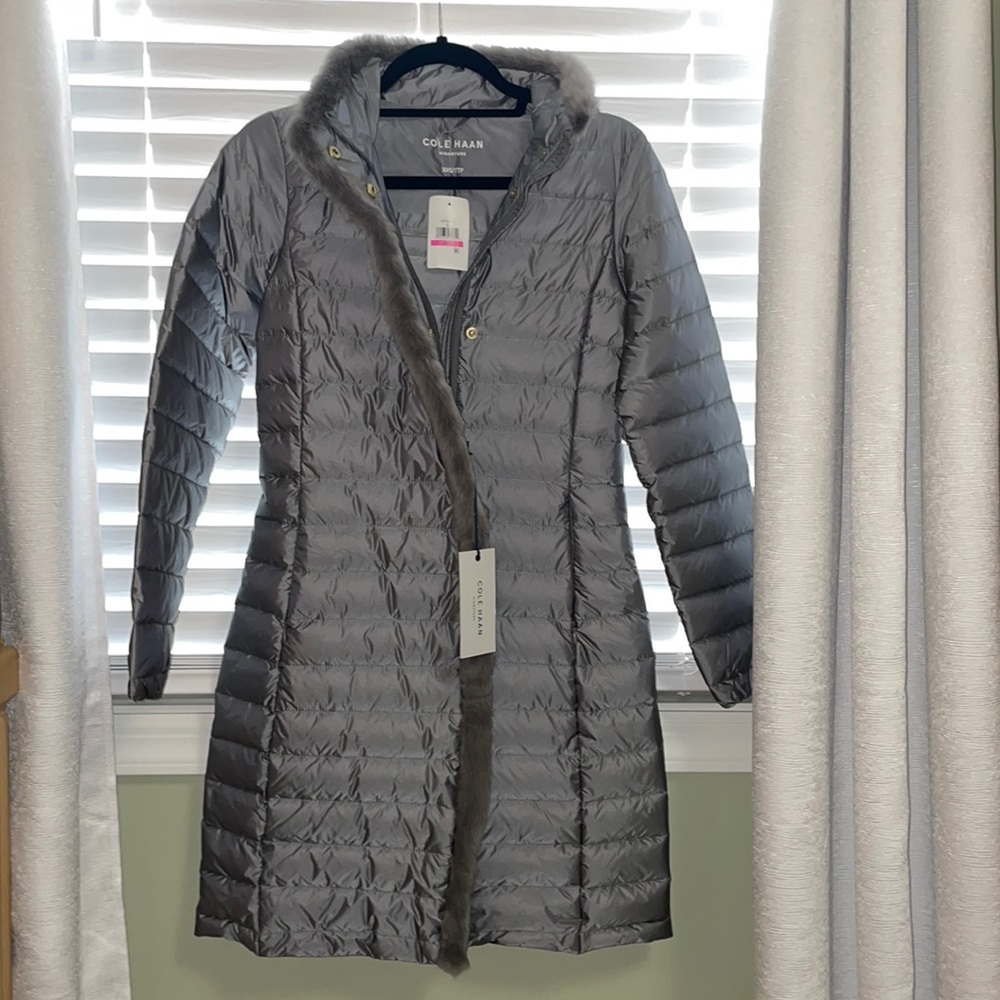 Brand new. Cole Haan signature packable coat with faux fur trim